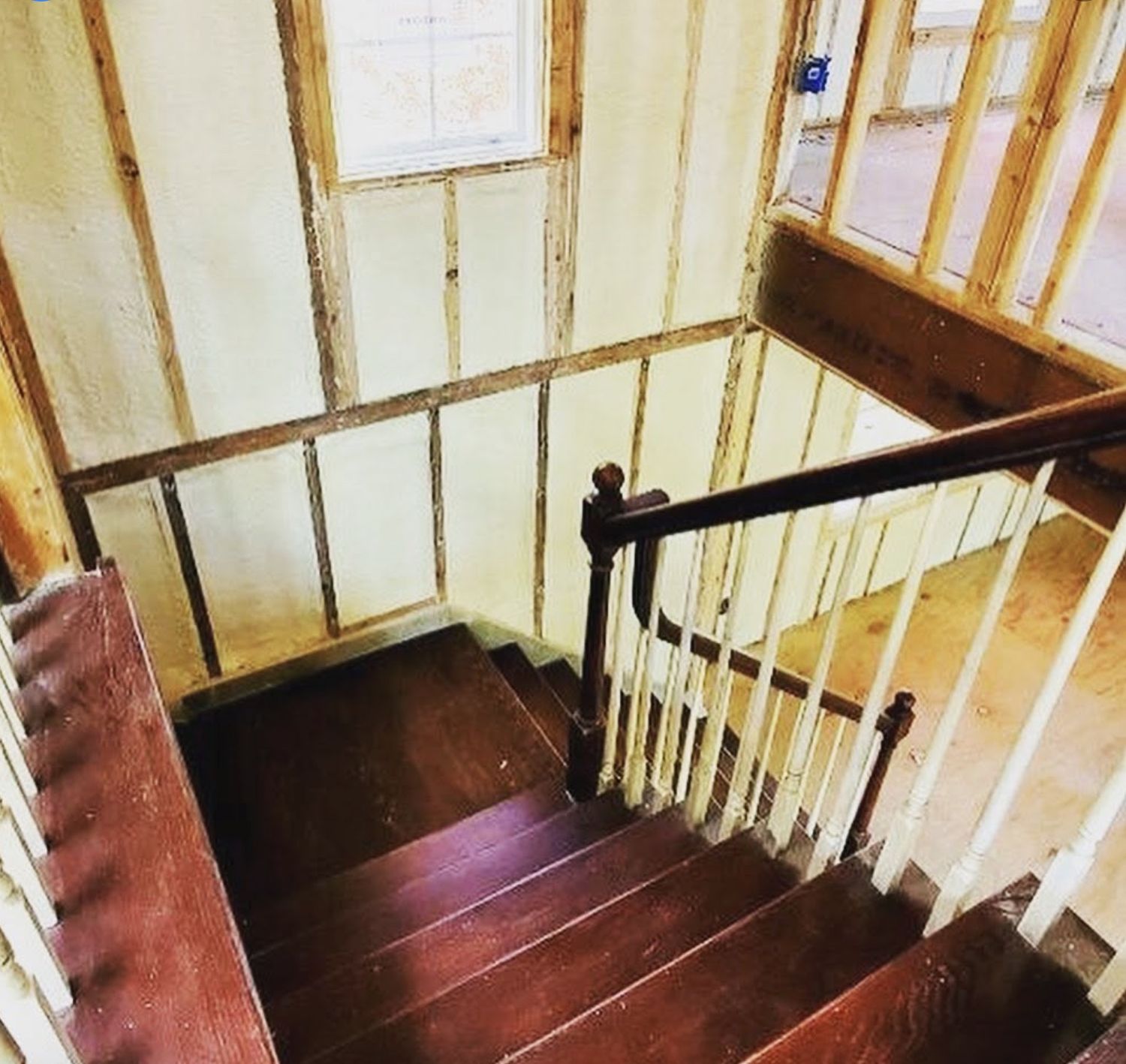 Stairwell walls spray foamed during a home renovation